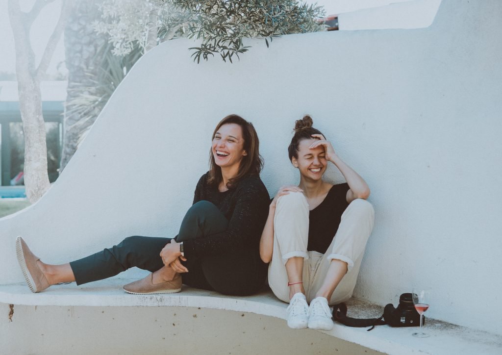 two women smiling